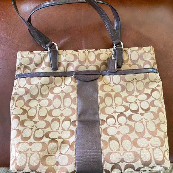 Coach Handbags - Coach Brown/Tan tote bag with signature canvas and stripe.